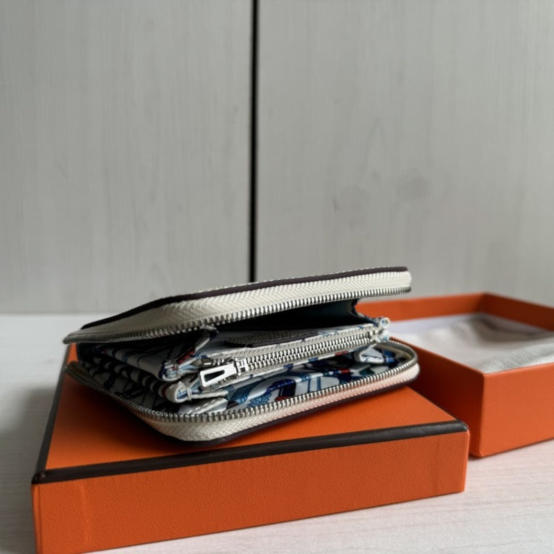 本革ラウンドファスナー二つ折り財布 リバーシブル エプソン革　黒 オレンジ 白 ブルー