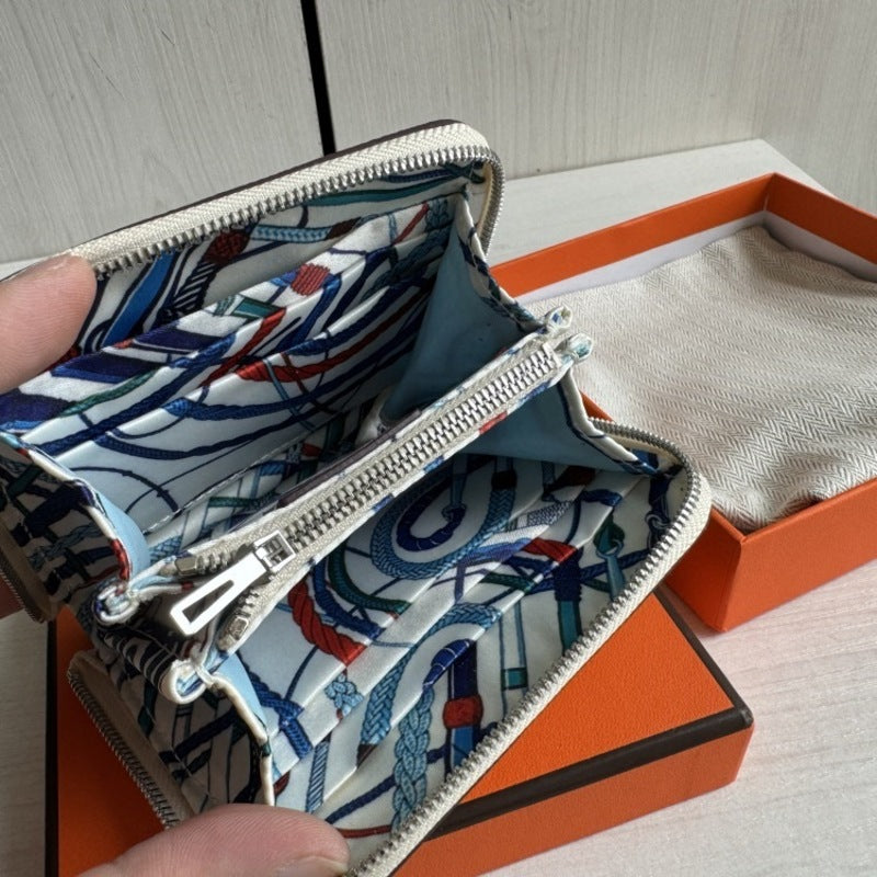 本革ラウンドファスナー二つ折り財布 リバーシブル エプソン革　黒 オレンジ 白 ブルー