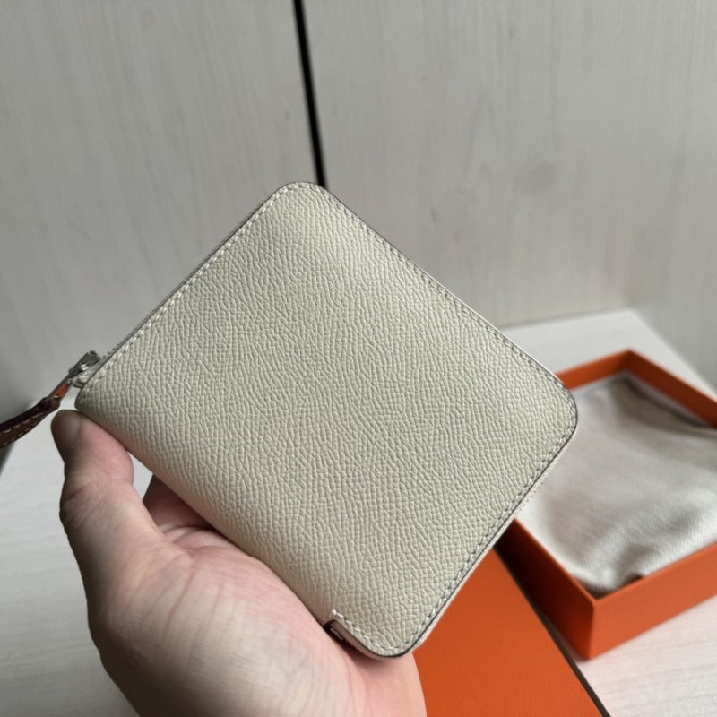 本革ラウンドファスナー二つ折り財布 リバーシブル エプソン革　黒 オレンジ 白 ブルー