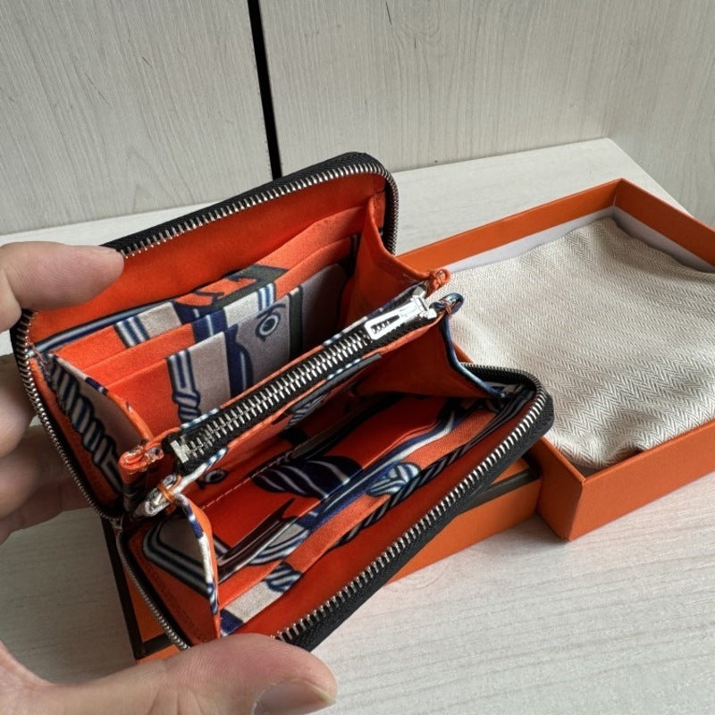 本革ラウンドファスナー二つ折り財布 リバーシブル エプソン革　黒 オレンジ 白 ブルー