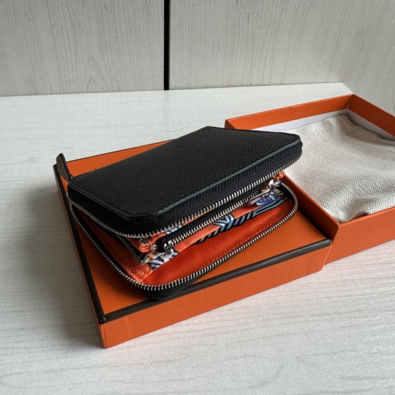 本革ラウンドファスナー二つ折り財布 リバーシブル エプソン革　黒 オレンジ 白 ブルー