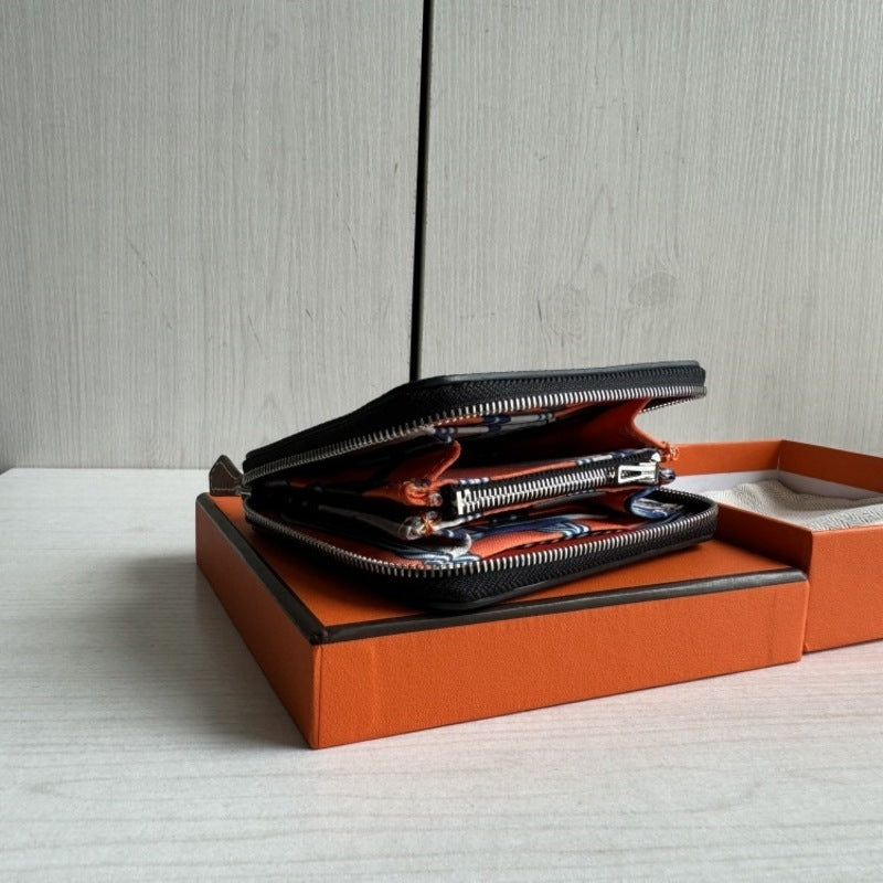 本革ラウンドファスナー二つ折り財布 リバーシブル エプソン革　黒 オレンジ 白 ブルー