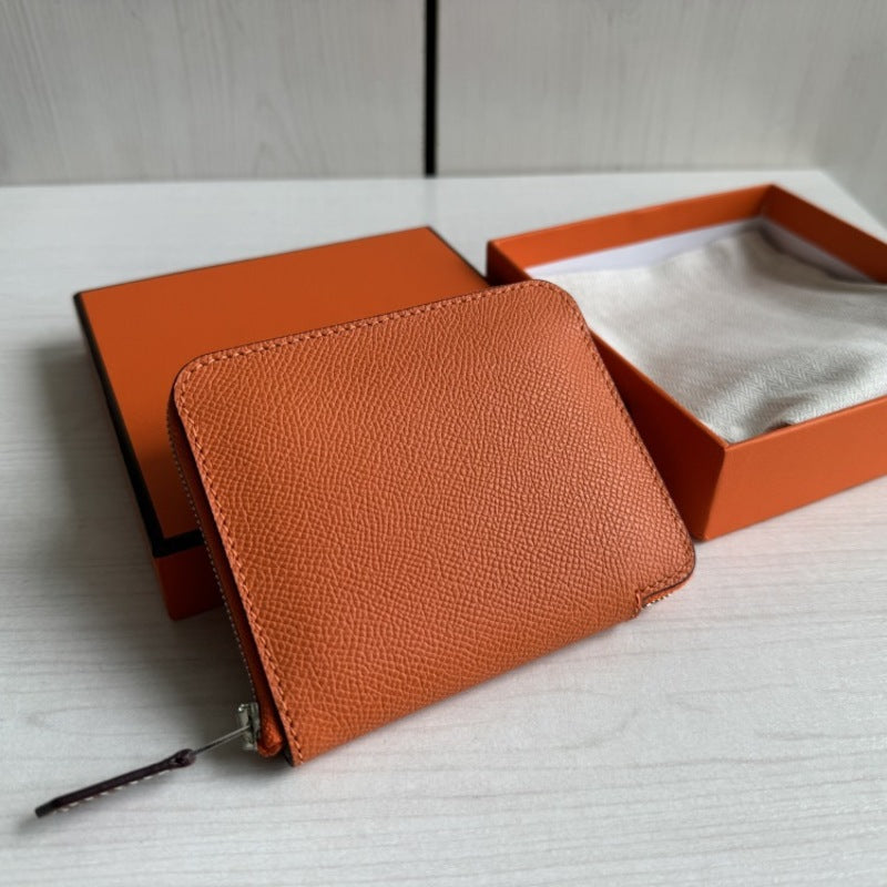 本革ラウンドファスナー二つ折り財布 リバーシブル エプソン革　黒 オレンジ 白 ブルー