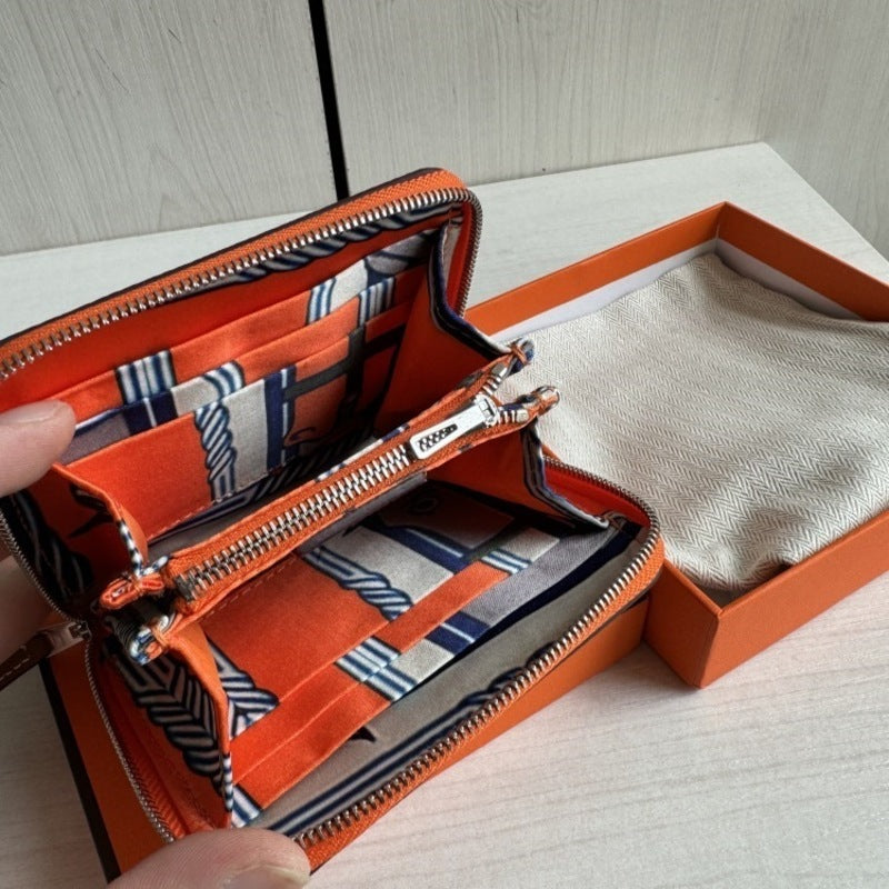 本革ラウンドファスナー二つ折り財布 リバーシブル エプソン革　黒 オレンジ 白 ブルー