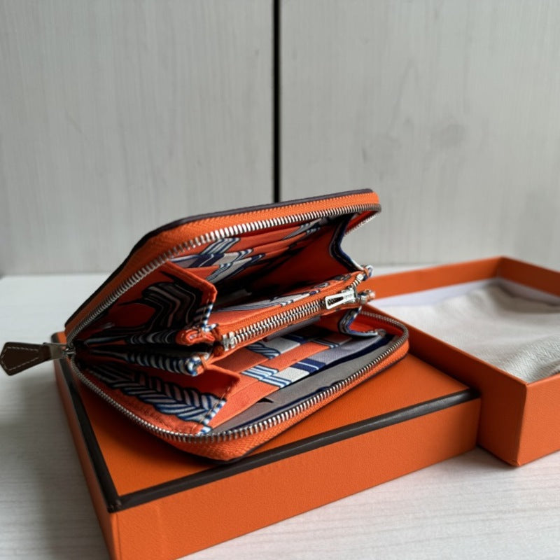 本革ラウンドファスナー二つ折り財布 リバーシブル エプソン革　黒 オレンジ 白 ブルー