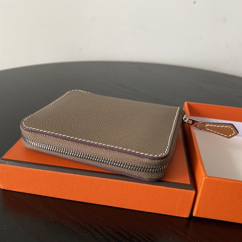 本革ラウンドファスナー二つ折り財布 リバーシブル エプソン革　黒 オレンジ 白 ブルー