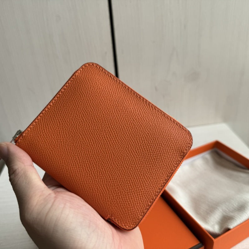 本革ラウンドファスナー二つ折り財布 リバーシブル エプソン革　黒 オレンジ 白 ブルー