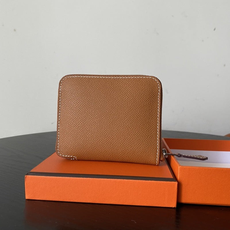 本革ラウンドファスナー二つ折り財布 リバーシブル エプソン革　黒 オレンジ 白 ブルー