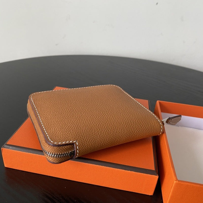 本革ラウンドファスナー二つ折り財布 リバーシブル エプソン革　黒 オレンジ 白 ブルー