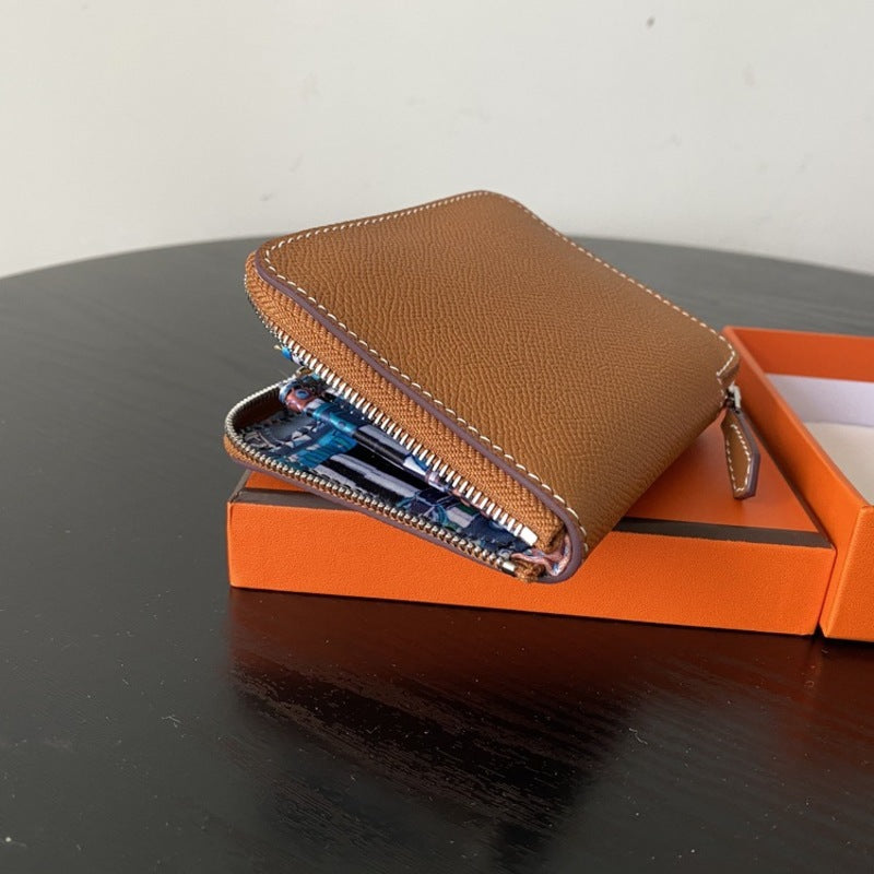 本革ラウンドファスナー二つ折り財布 リバーシブル エプソン革　黒 オレンジ 白 ブルー