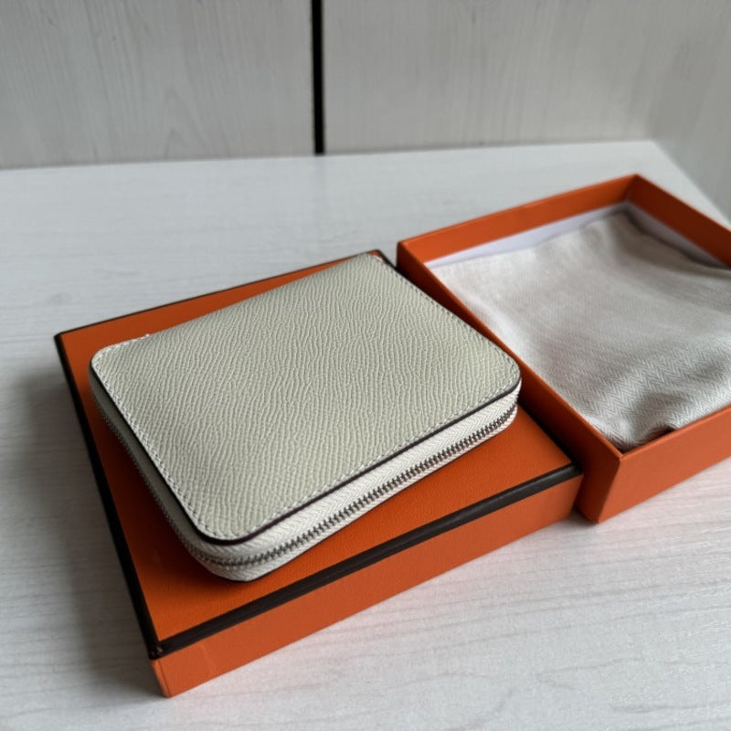 本革ラウンドファスナー二つ折り財布 リバーシブル エプソン革　黒 オレンジ 白 ブルー