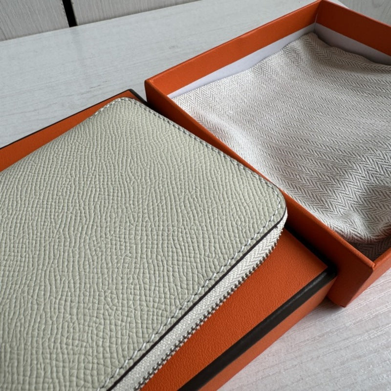 本革ラウンドファスナー二つ折り財布 リバーシブル エプソン革　黒 オレンジ 白 ブルー